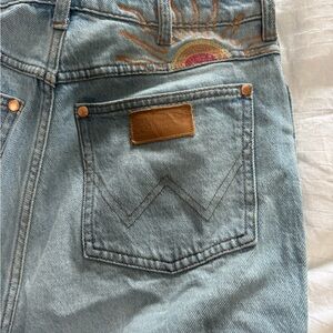 Wrangler Light Blue Flare Jeans with Embroidered Sun